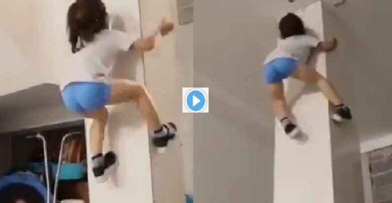 small-girl-climbing-up-on-pillar-video-goes-viral-on-social-media